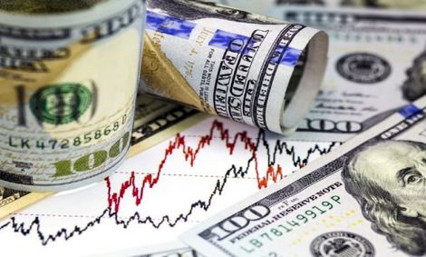 نرخ دلار چگونه روی بورس تاثیر می‌گذارد؟